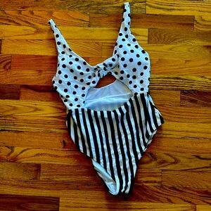 One piece bathing suit, size large